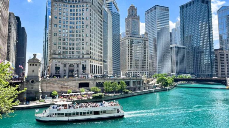 A boat cruise near the tall buildings in Chicago river