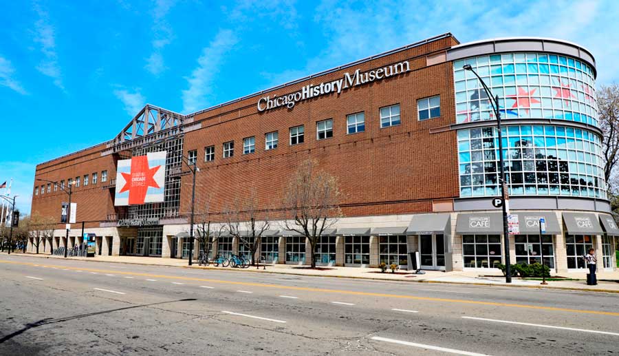 The Chicago History Museum building from the outside and the clear blue sky over it