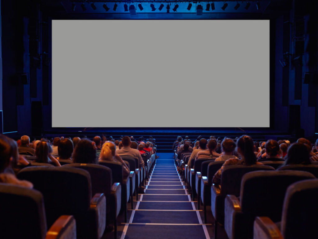 Empty cinema screen with audience