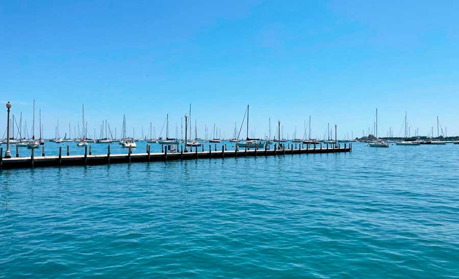Boats on Lake Michigan can be seen while walking in Chicago Lakefront Trail