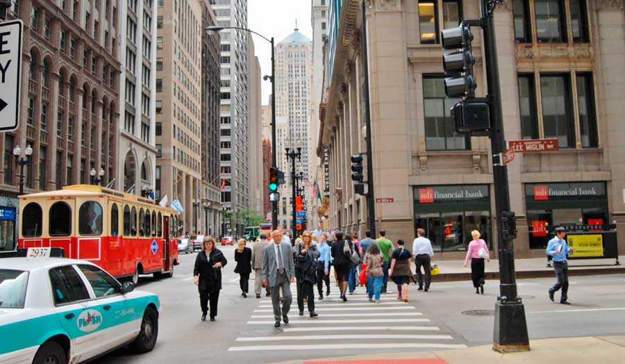 Locals from Chicago crossing a street