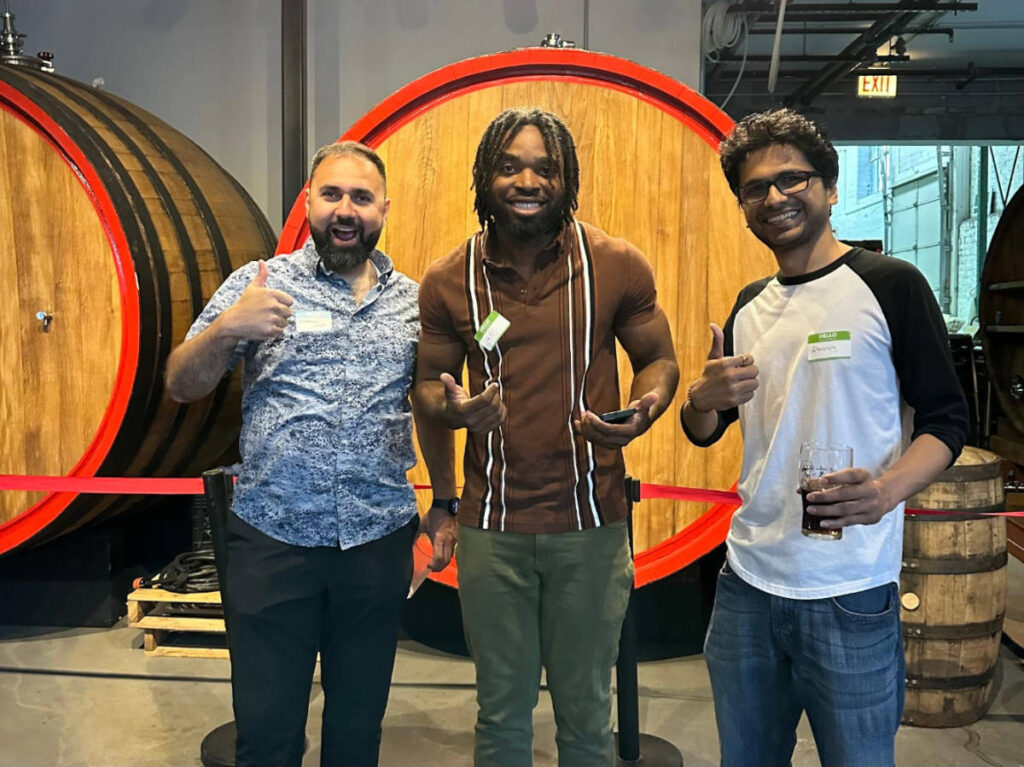 People smiling for a photo during the Travel Lemming's Chicago Community Meetups