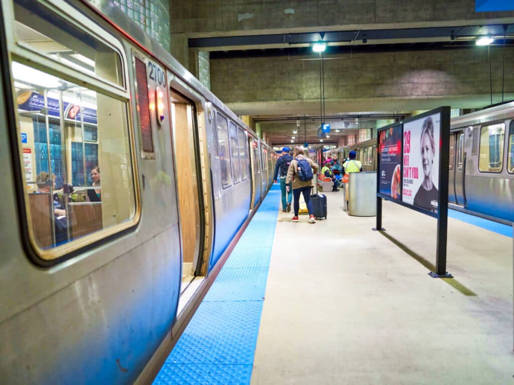 View of the tourists at the blue line subway station in Chicago O'Hare International Airport