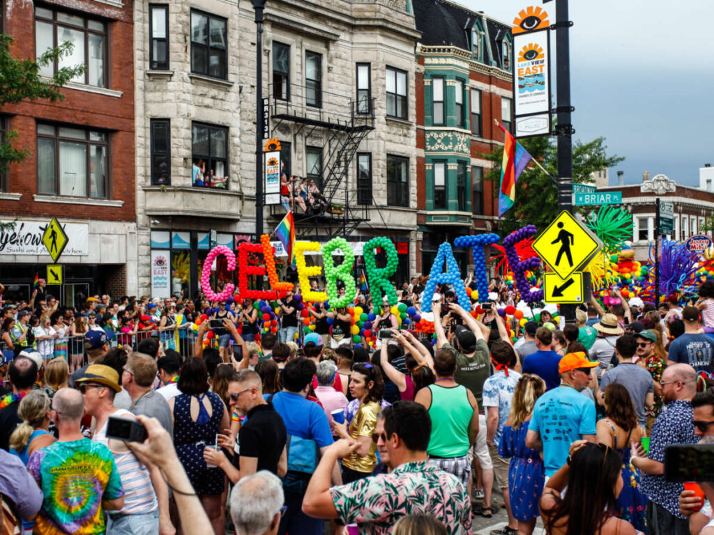Crowd of People watching the Chicago Pride Parade