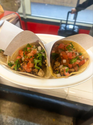 Closeup view of the two wrapped chicken tacos