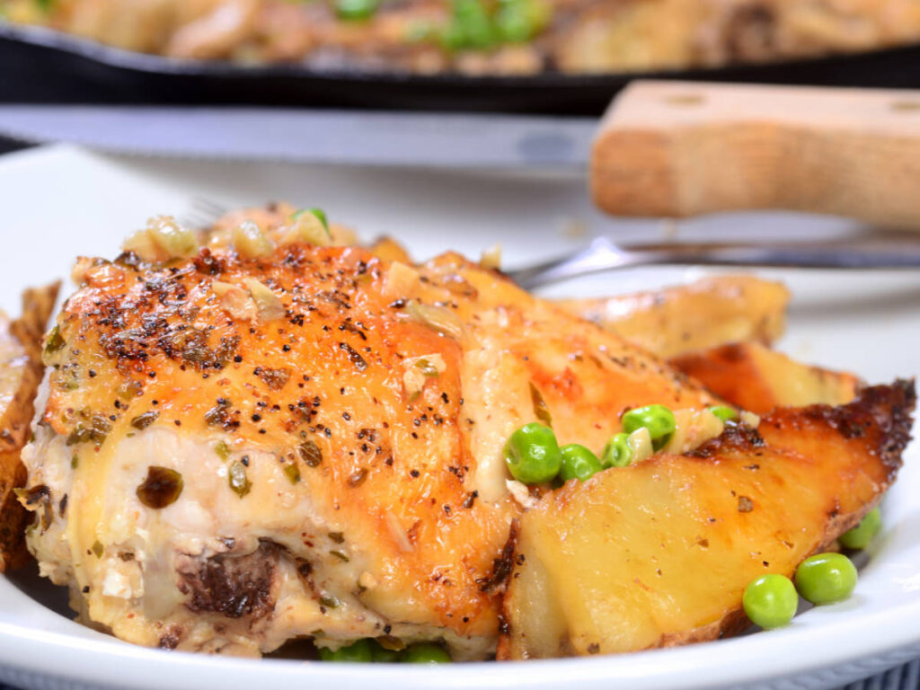 A Chicken Vesuvio on a plate