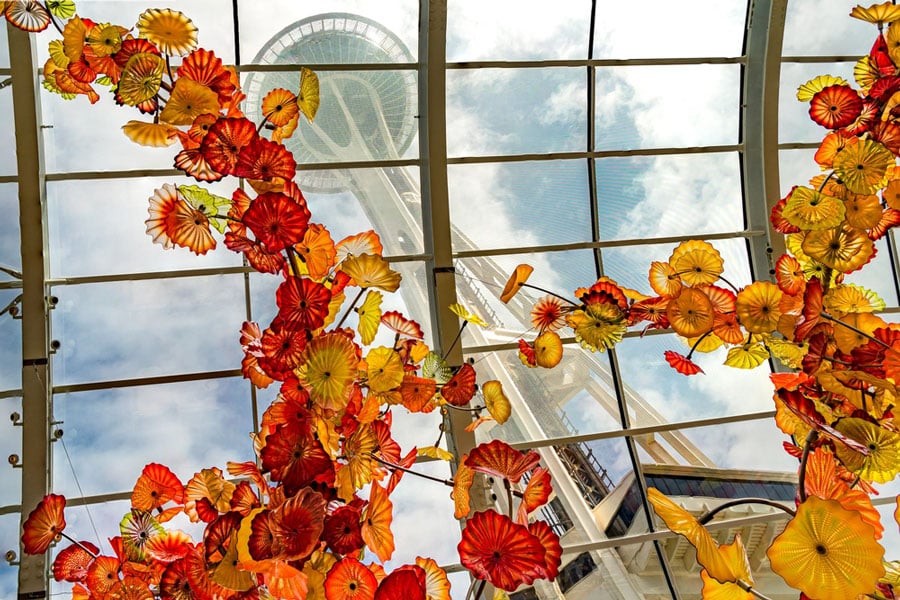 The Space Needle can be seen from Chihuly Garden and Glass