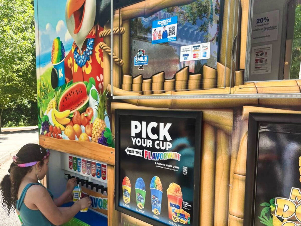 A child getting a frozen drink