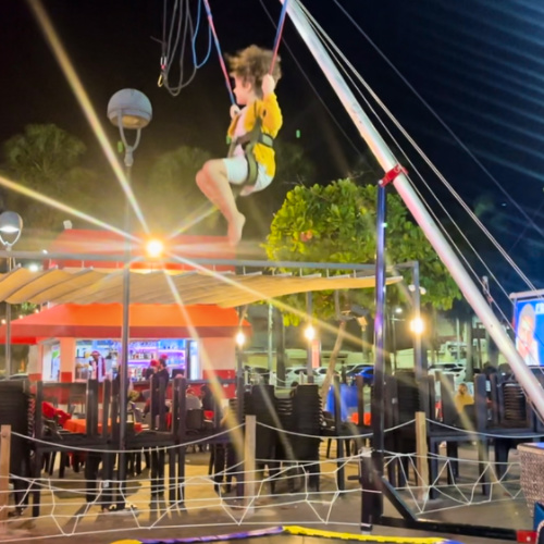 A child enjoying the bungee ride in Olympic Park