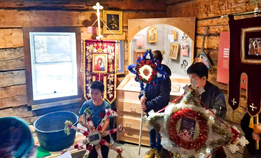 View of people celebrating Russian Orthodox Christmas at the Baranov Museum