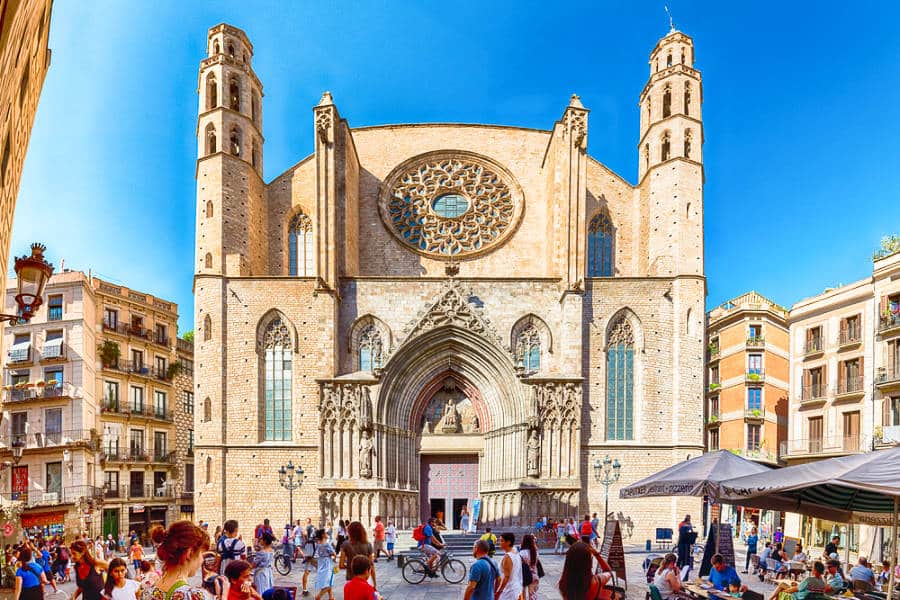 View of people roaming outside the Church of Santa Maria del Mar
