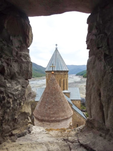 View of the top of two churches from the castle walls at Ananuri