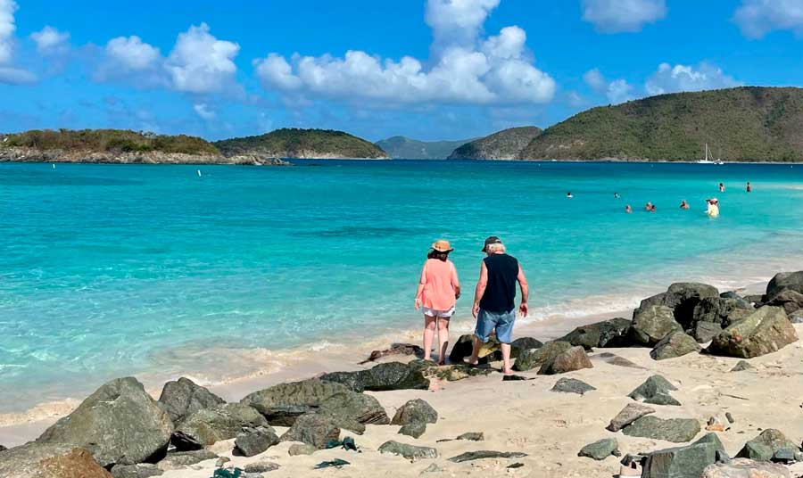 People enjoying their day during a sunny day in Cinnamon Bay Beach