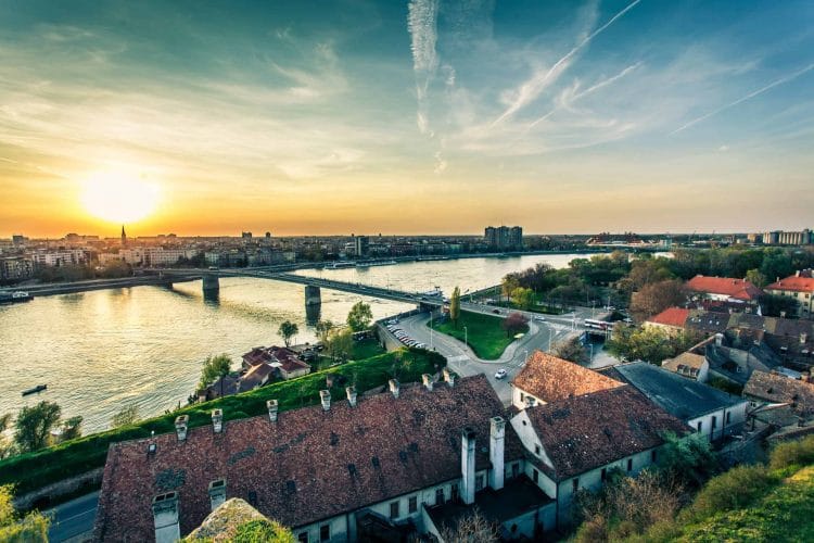 Aerial view of Novi Sad with bridge on sunset