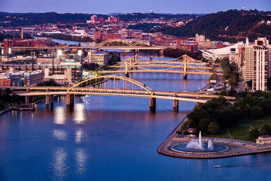 Aerial view of the cityscape and bridges over the river