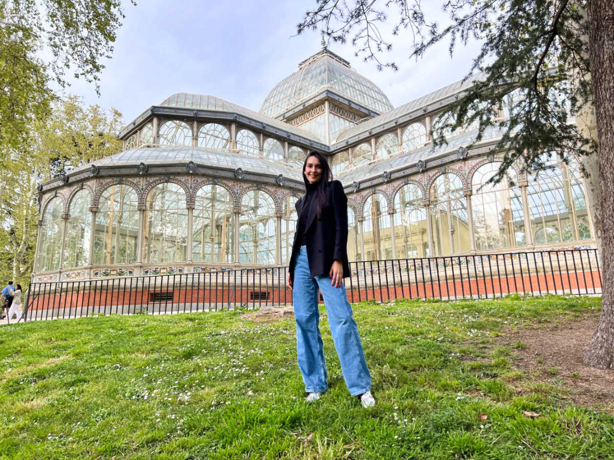 Travel Lemming writer Clara Kesseler posing for a photo outside Palacio de Cristal