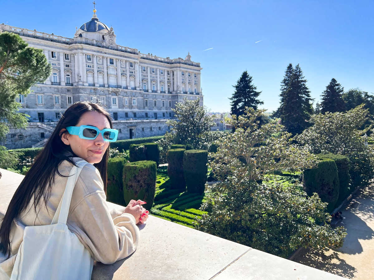 Travel Lemming writer Clara Kesseler enjoying the overlooking view of the Sabatini Garden in front of the palace