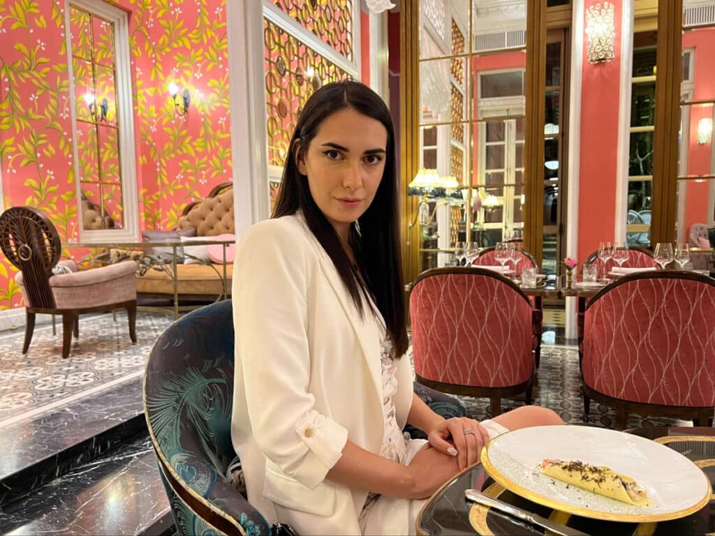 Clara posing for a photo at the Pink Pearl