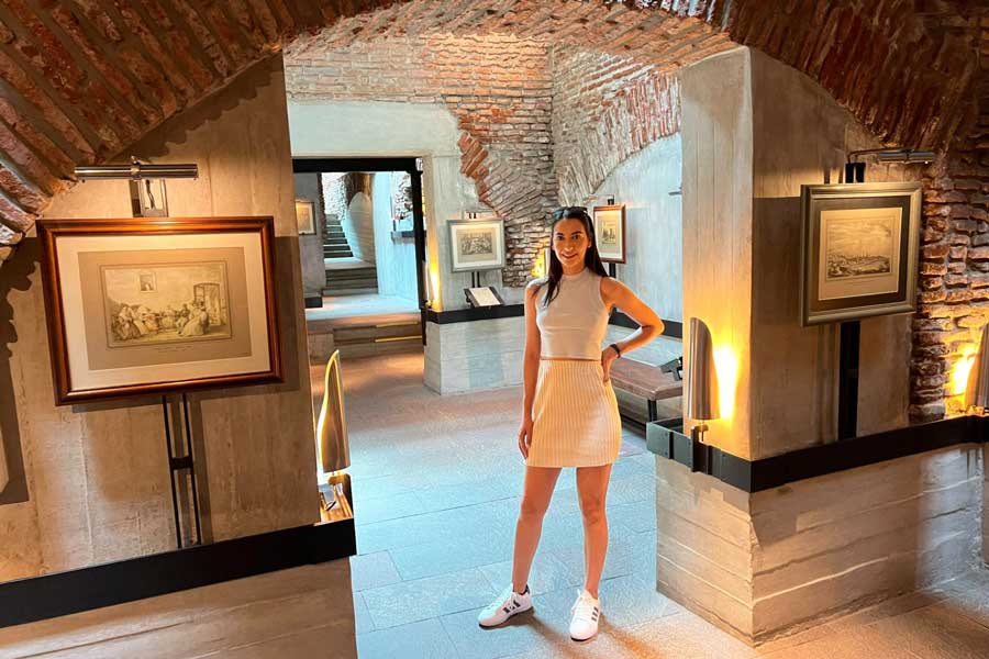 Clara posing for a photo inside El Zanjón