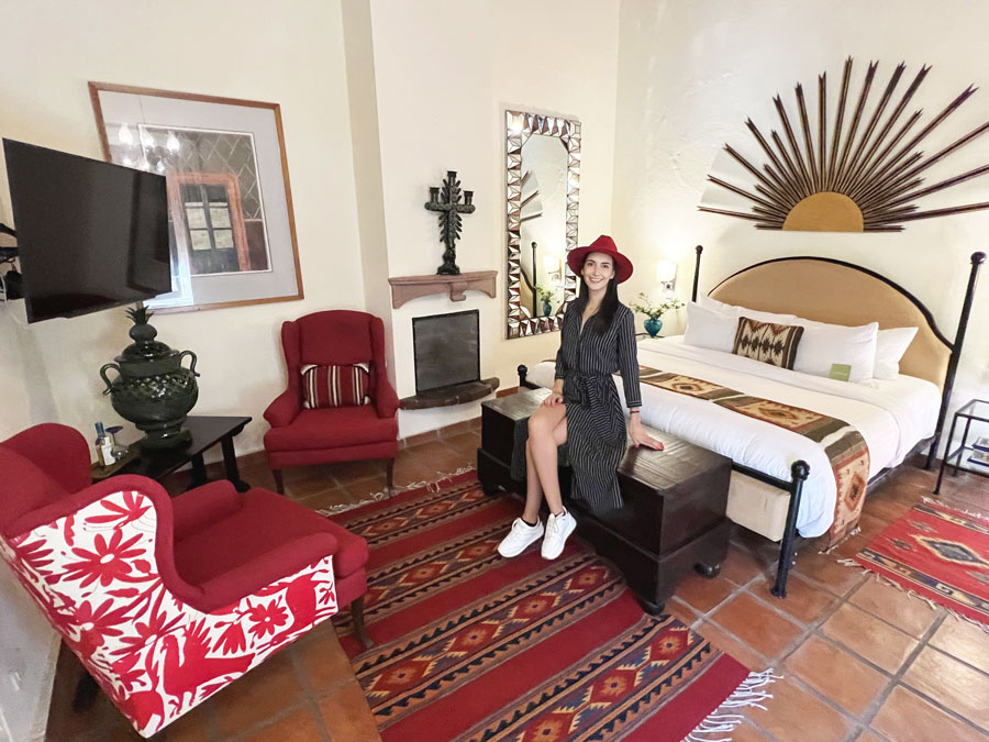 View of Clara in a bed in the Hacienda El Santuario Hotel in San Miguel de Allendeo