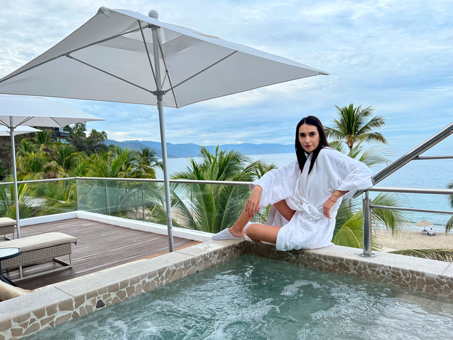 Clara in an outdoor jacuzzi in Hyatt Ziva