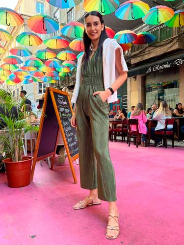 Clara posing for a photo in Pink Street