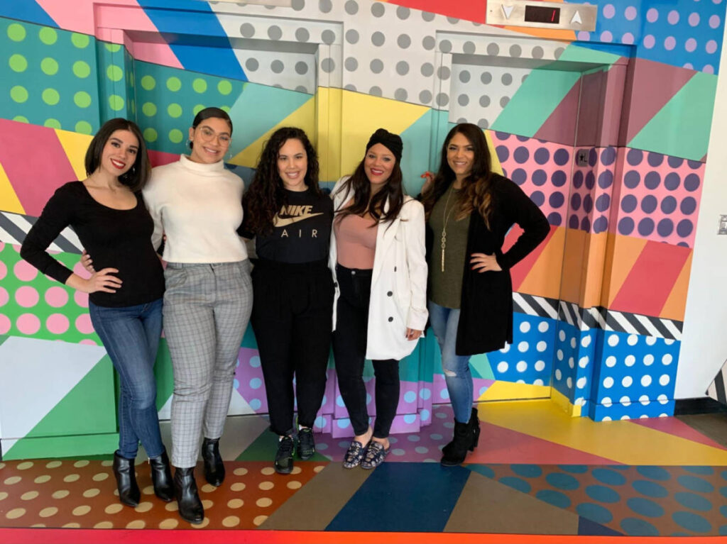 The author, Claudicet Pena and her friends at the colorful lobby of Studio Allston Hotel