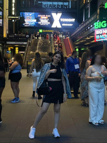 The author Claudicet Pena posing at the TD Garden at night