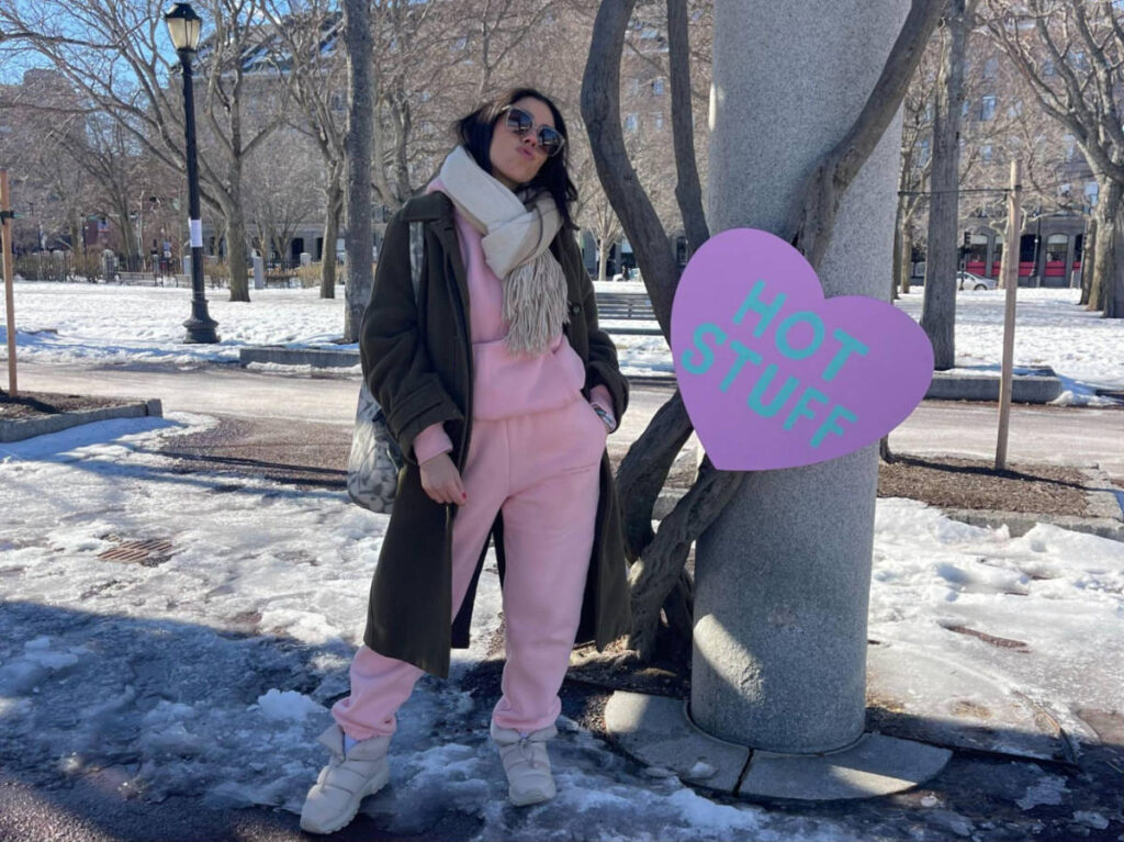 The author Claudicet Pena posing for a photo on a winter day in Boston’s North End