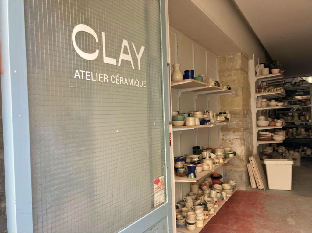 View of the door and the interior of Clay Atelier’s studio seen from the entrance