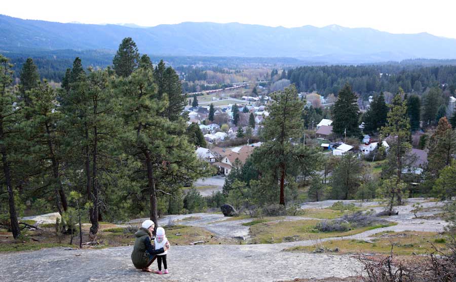 A woman with her child with the overlooking view of the Cle Elum Town