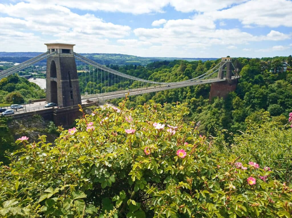 Overlooking view of the Clifton Suspension Bridge surrounded by lush landscape