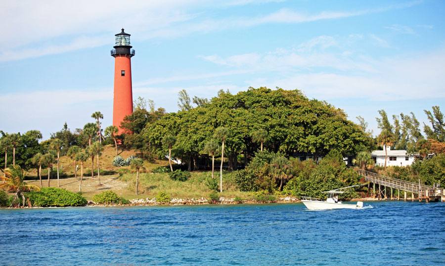 The Climbable Lighthouse in Jupiter Florida and the clear blue water, and sky