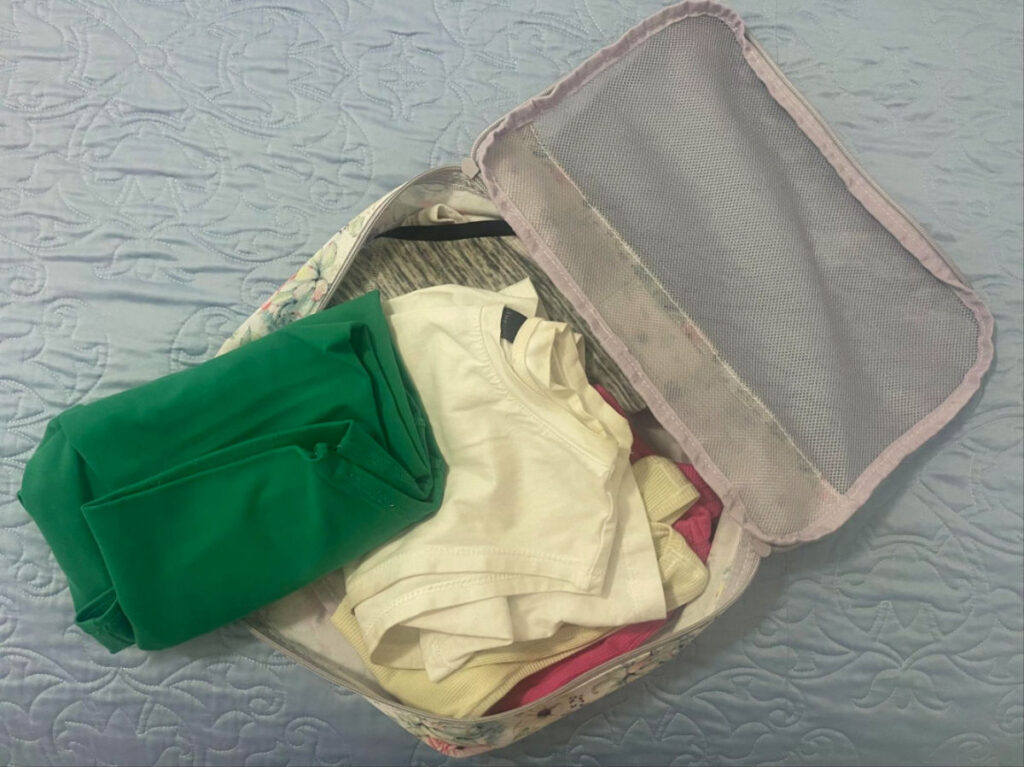 View of Clothes packed in a small packing cube