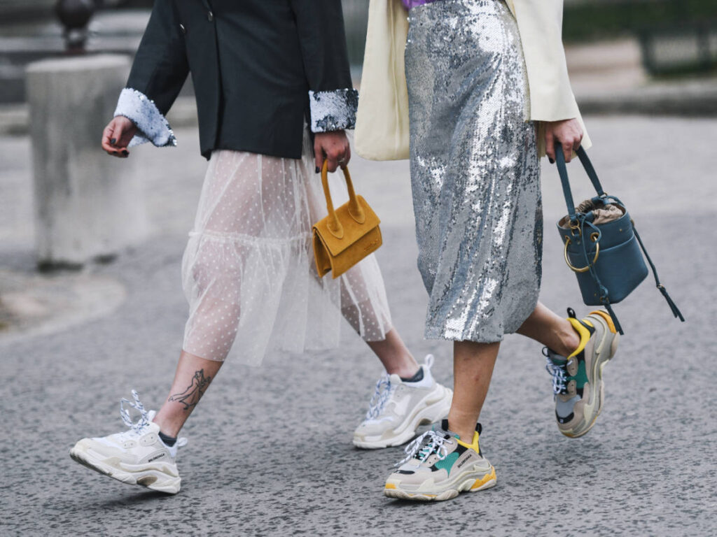 Two women wearing their outfit for a night party