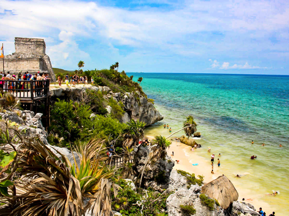 View of the crowd enjoying the overlooking view of the ocean from the Mayan Ruins