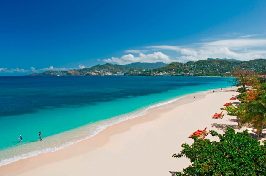 Aerial view of the turquoise blue and the sandy white shoreline of Grenada