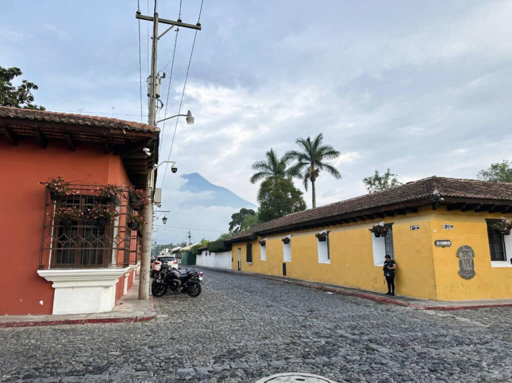 Colorful structures and a cobblestone street in Antigua