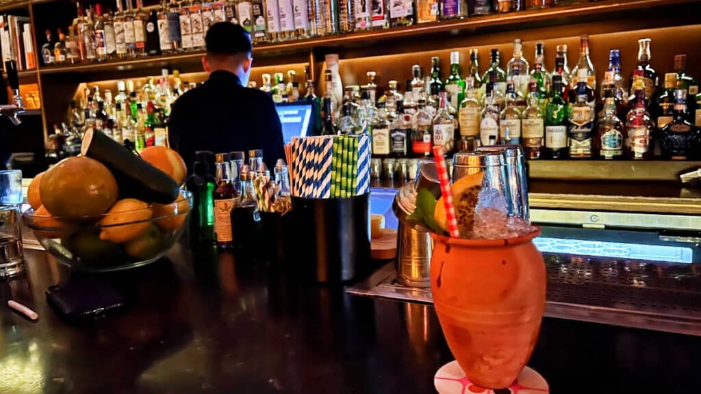 A cocktail on a bar counter in Licorería Limantour