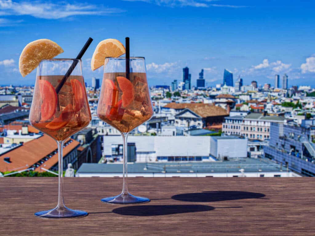 Tow glasses of cocktail drinks in the rooftop bar in Milan