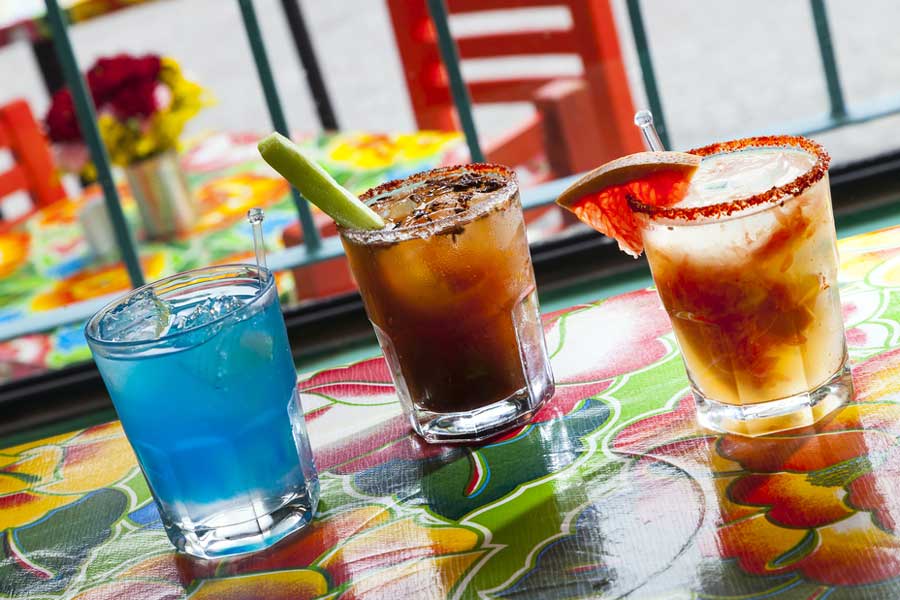 Three glasses of Colorful cocktails