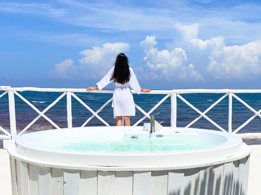 Clara looking at the Caribbean Sea from the Coco Limited Jacuzzi Terrace