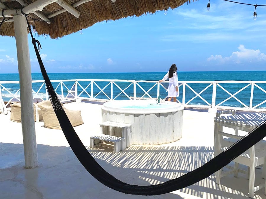 Clara admiring the ocean and a clear blue sky