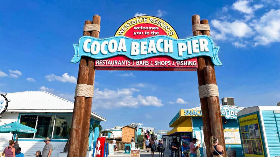 The arch sign of Cocoa Beach Pier at the entrance
