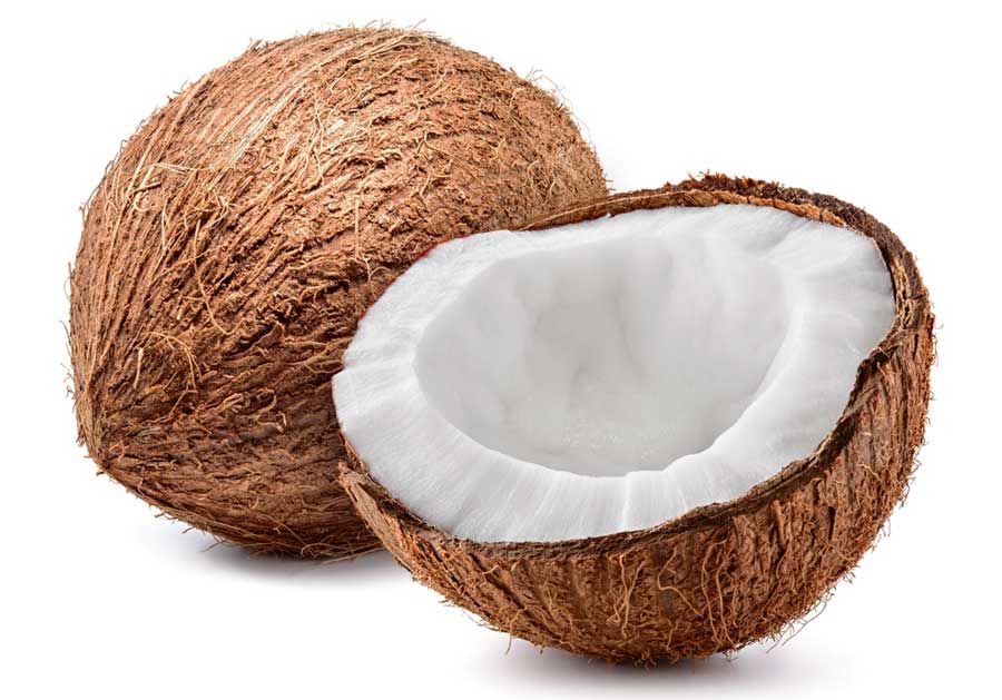 A whole and half coconut on a white background