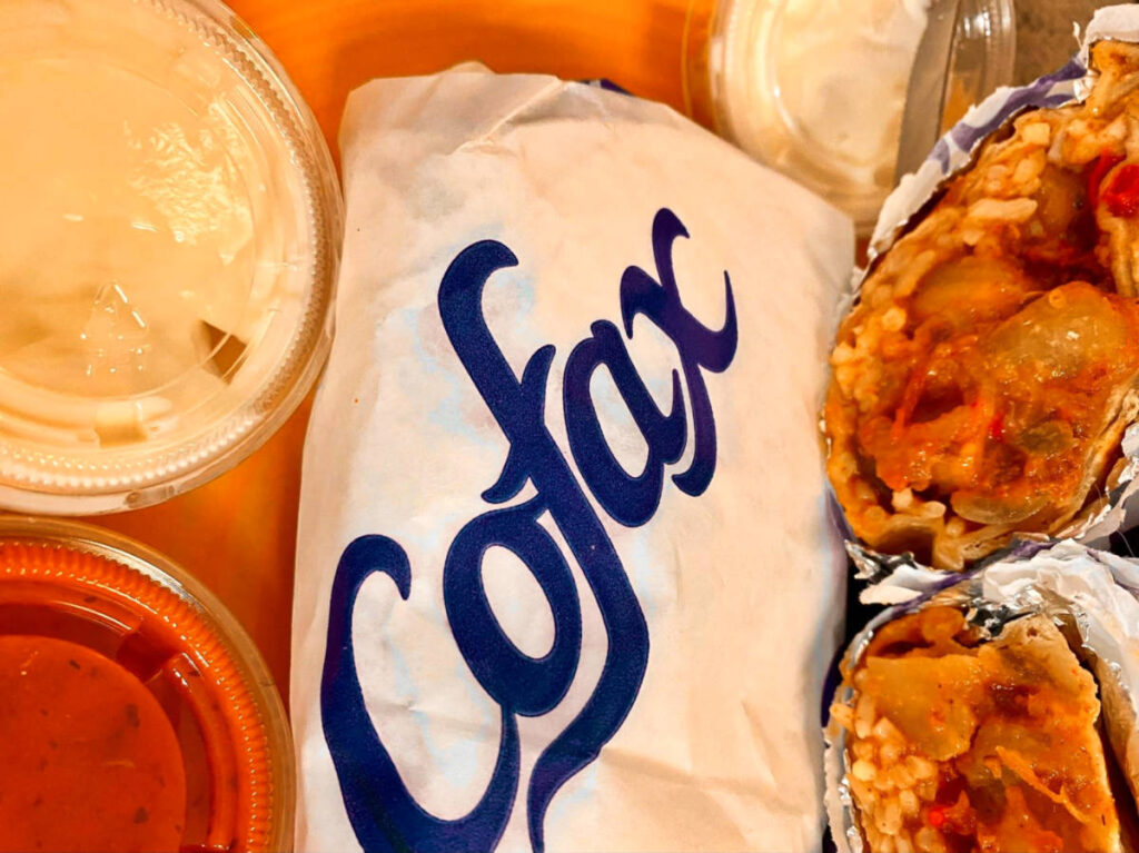 Closeup view of the sliced in half burrito and the other with Cofax wrapper
