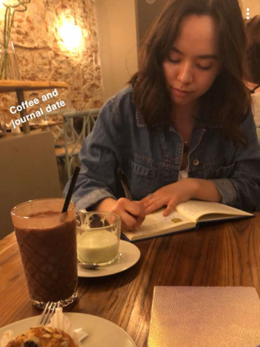 Journaling on a cafe in Florence