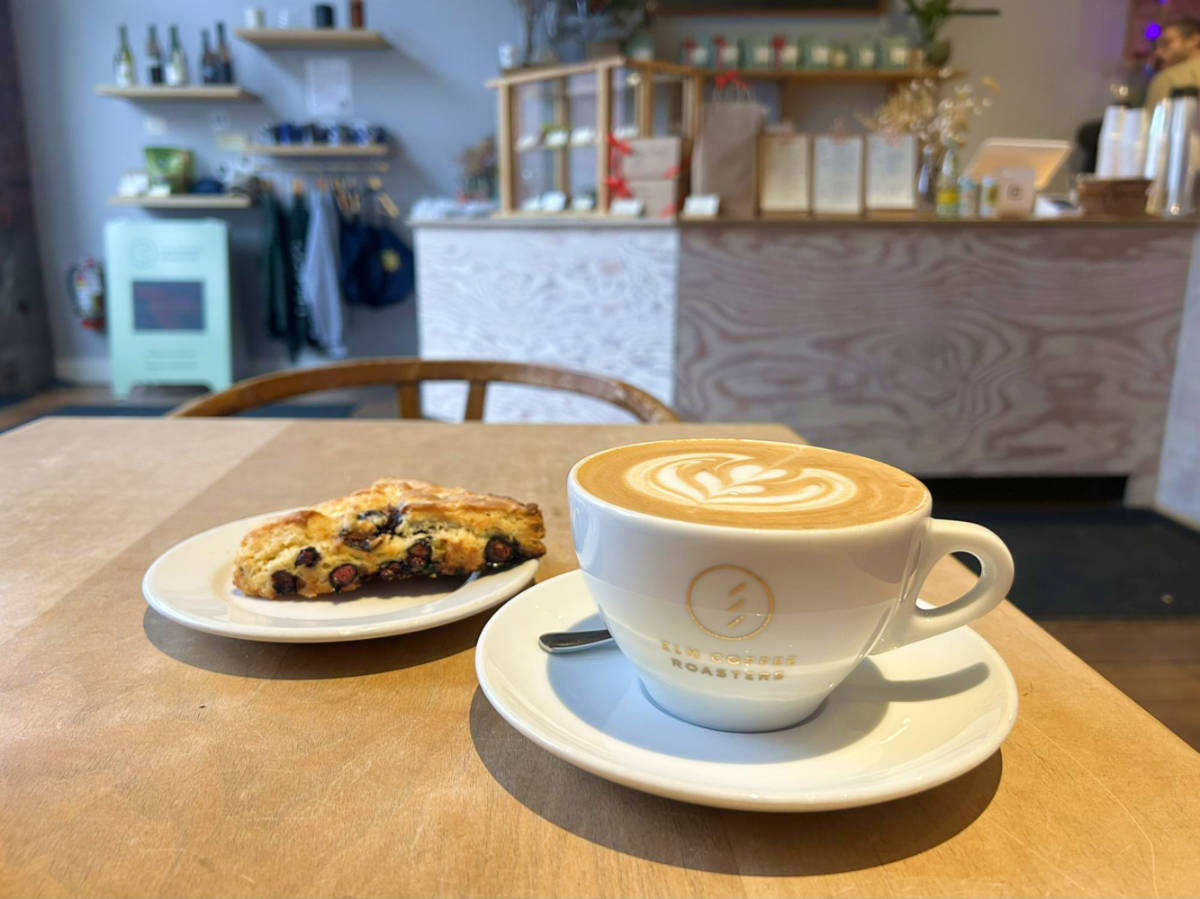 Closeup look of the coffee and pastry on the table in Elm Coffee