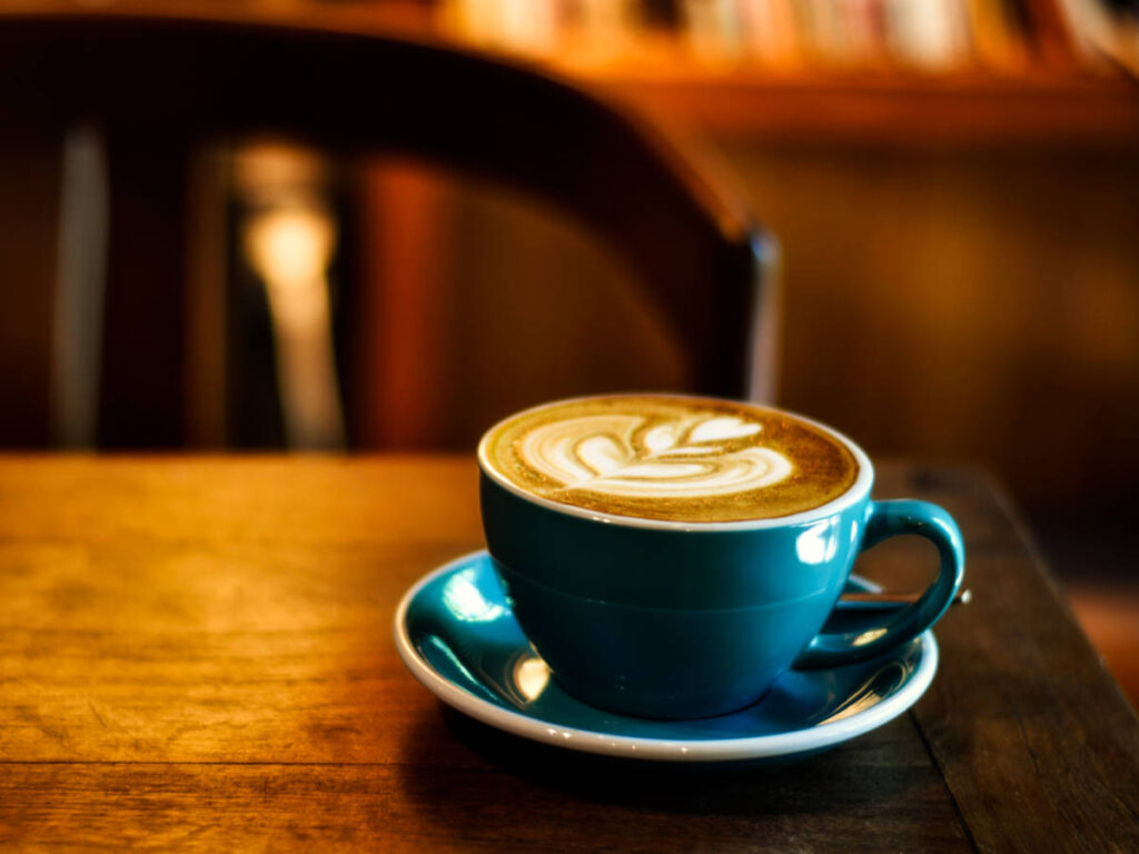 A cup of coffee on the wooden table