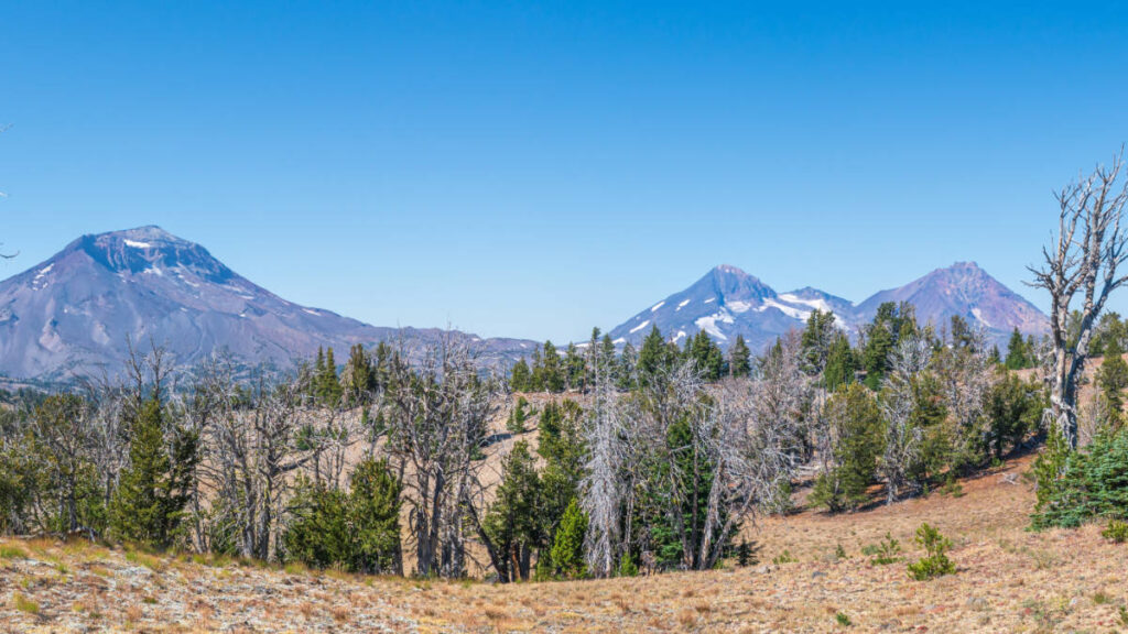 The Three Sisters Mountains from afar from Cold Water Cove Campground
